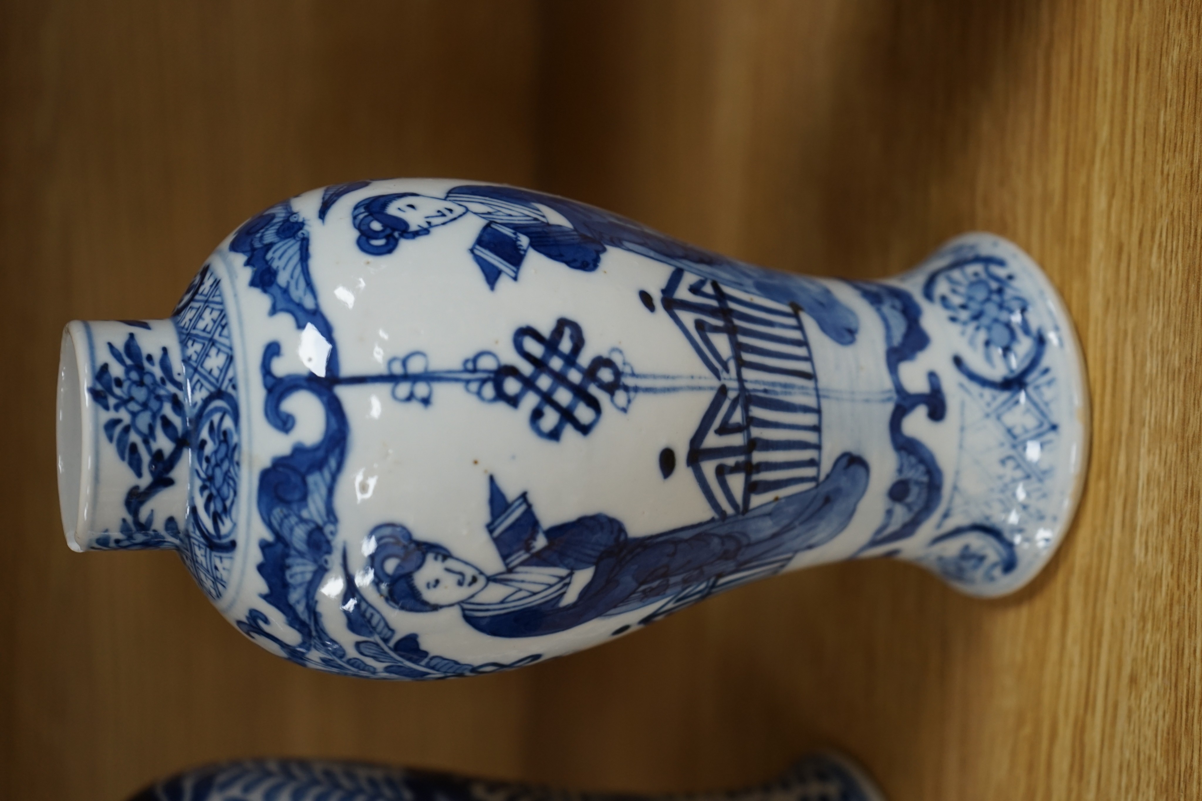 Two Chinese blue and white baluster vases, late 19th century and a Chinese sang de boeuf glazed vase, 27cm